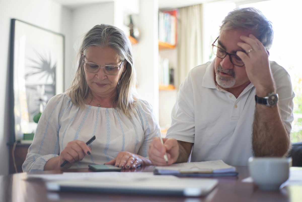 Older couple reviewing their estate planning.
