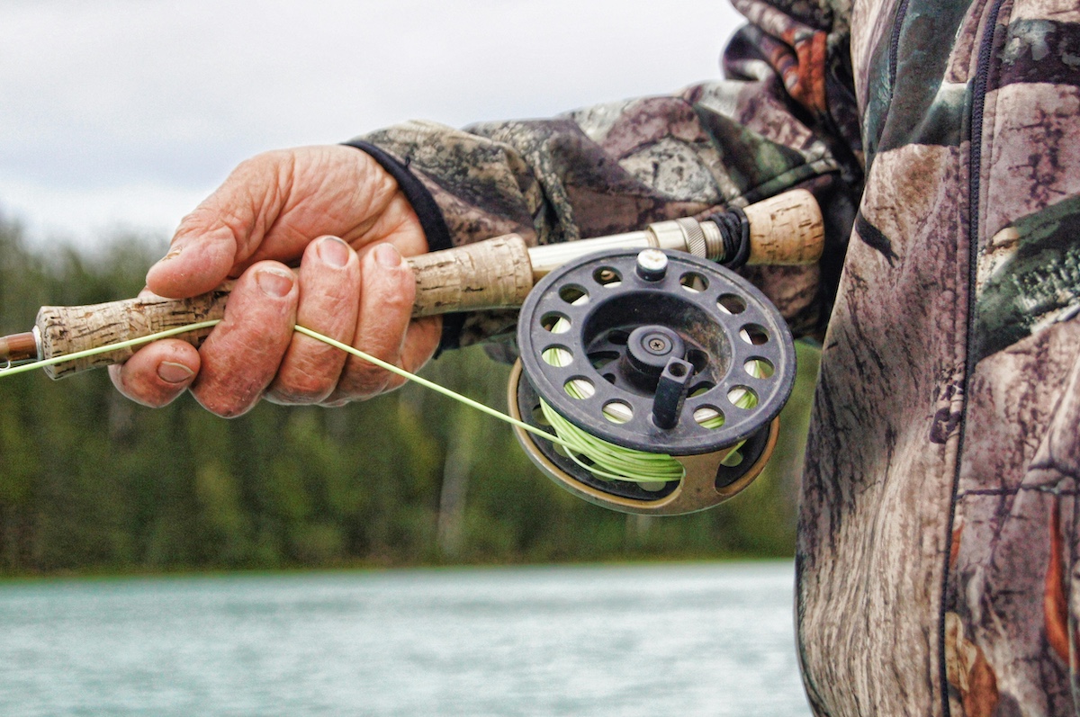 Older man fishing in the St. John's River near Welaka, Florida.